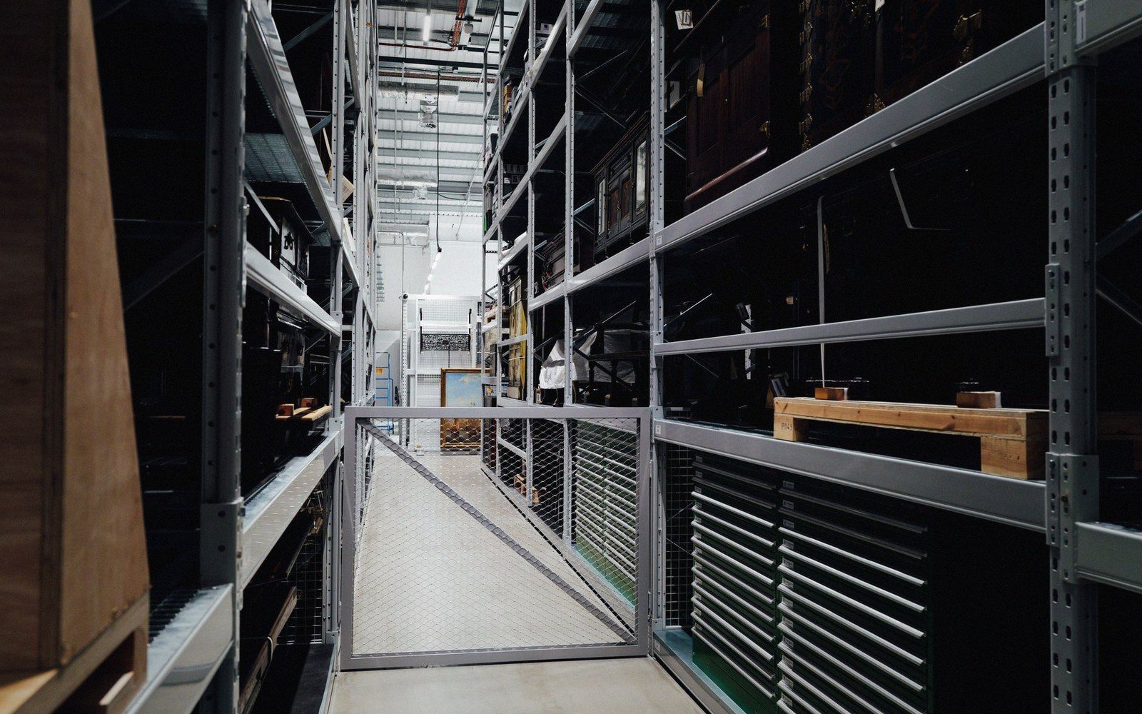 Climate-controlled art storage racking, works sleeved and stacked